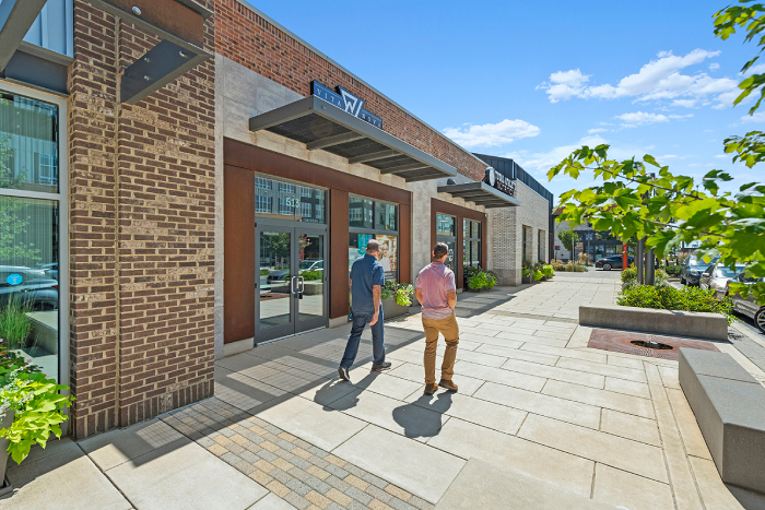 Two men walking down
